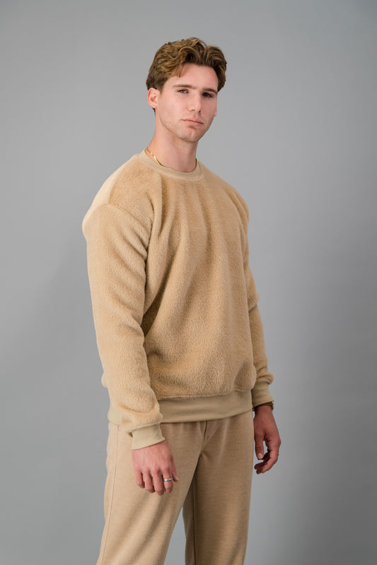 Model wearing our luxurious Caramel Fur Crew Neck Sweater with brushed knit caramel joggers.