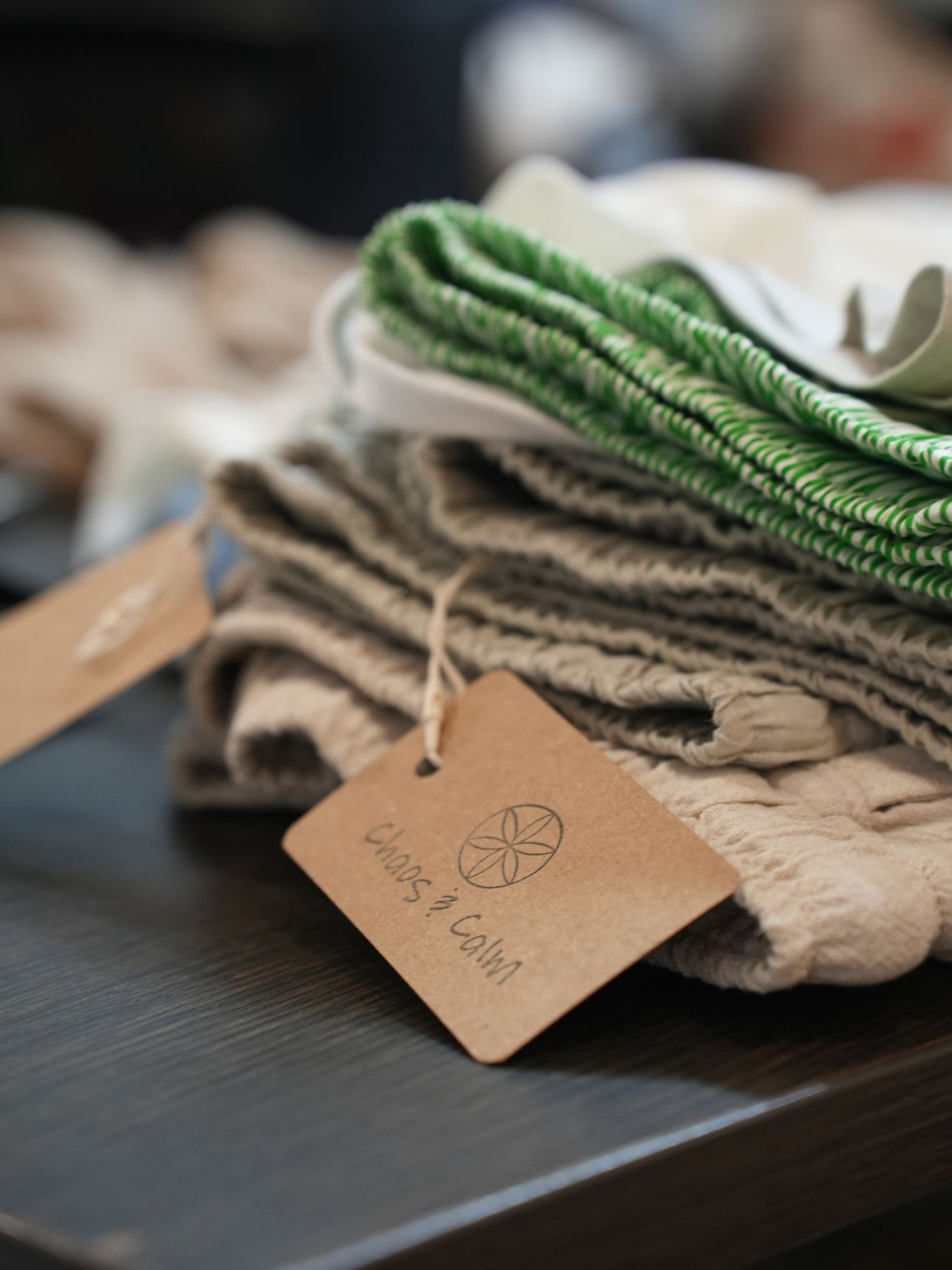 A close-up detail shot of shorts on a table with the label showing.