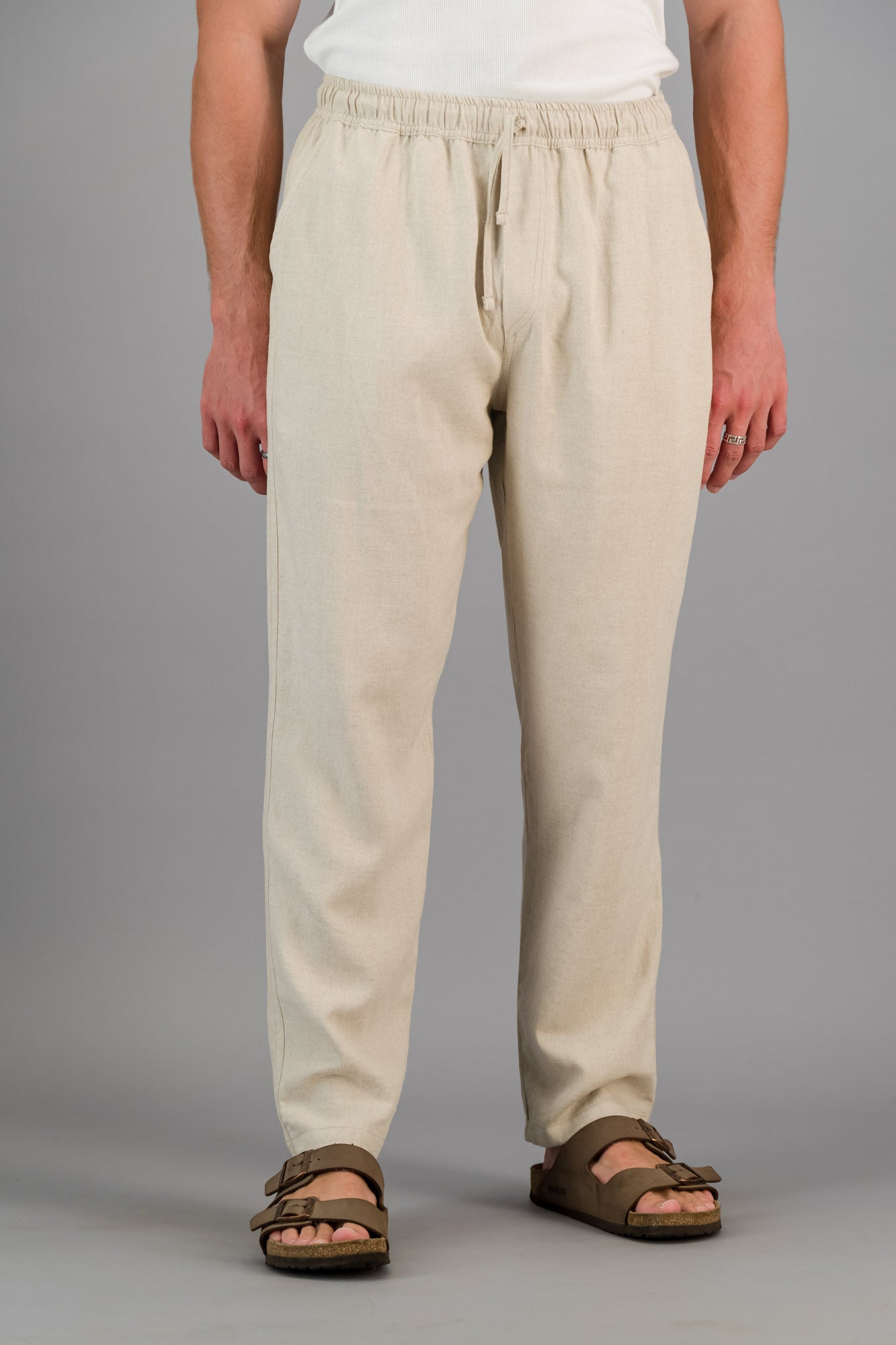 Model wearing our oatmeal linen viscose pull on pants with Birkenstocks.