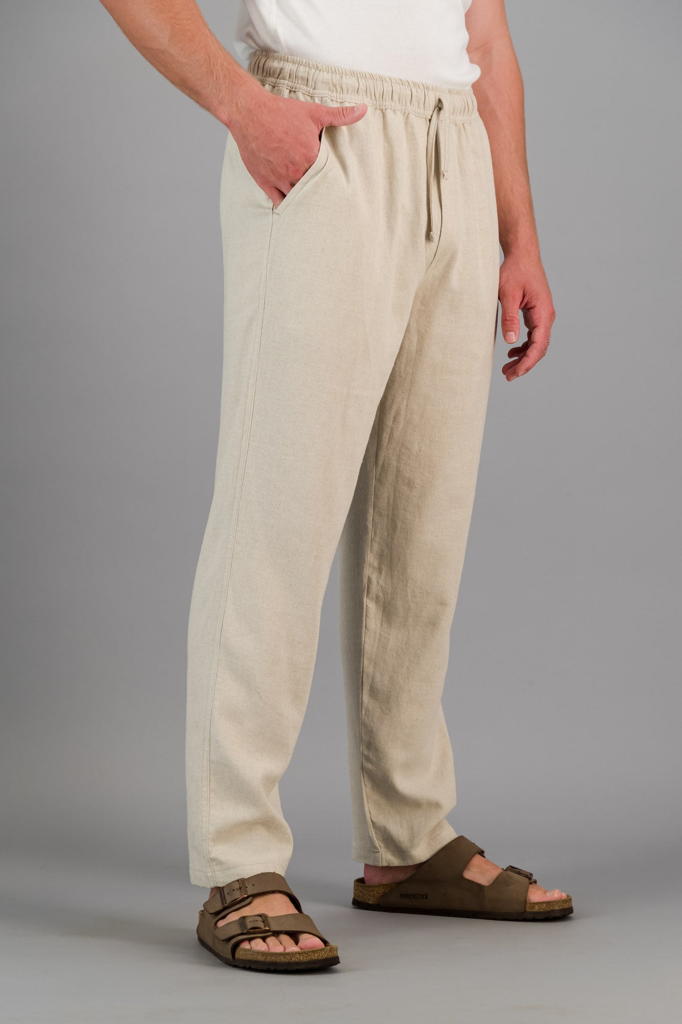 Model wearing our oatmeal linen viscose pull on pants with Birkenstocks.