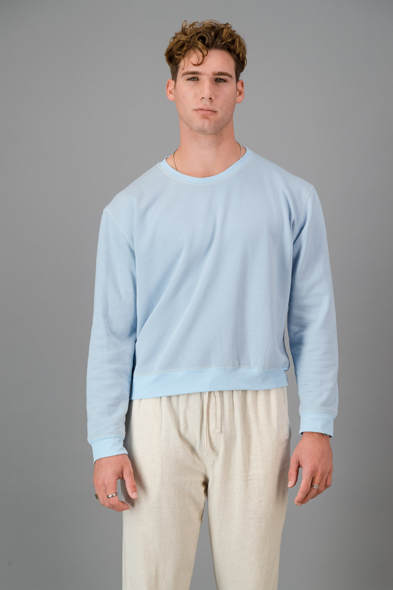 Model wearing Sky Blue Cotton Sweater (Cut-Off).